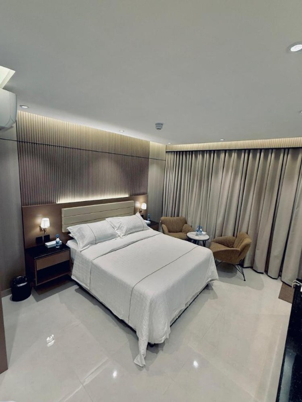 Room with modern queen bed setup in a 3 star hotel in Riyadh Saudi Arabia