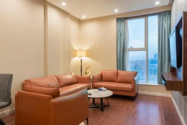 Lounge area with sofa seating and coffee table in a 3 star hotel in Riyadh