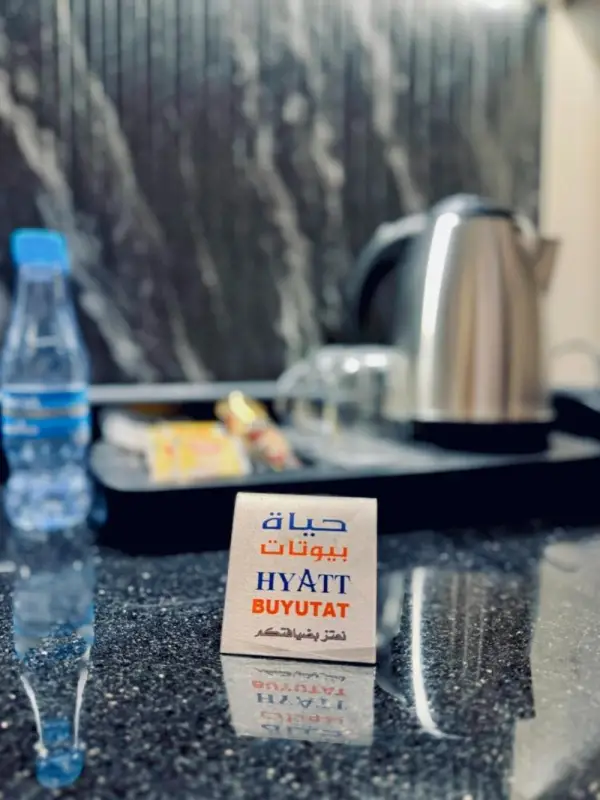 In-room coffee station and bottled water at a 3 star hotel in Riyadh